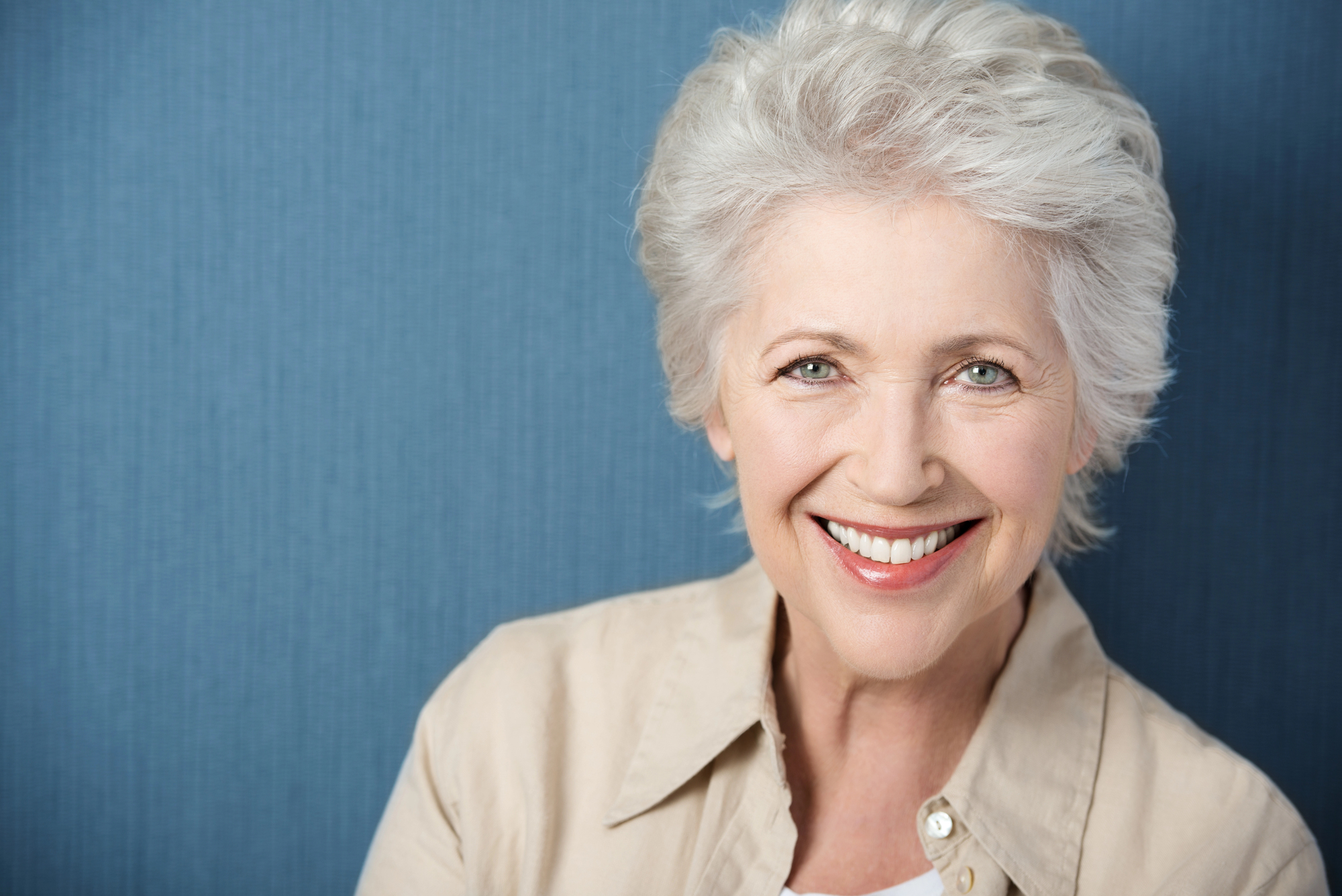 Mature woman with beautiful smile after smile makeover